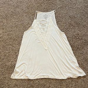 White, lace top with crisscrossing